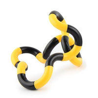 Tortillon de manipulation sensorielle, alternant segments jaunes et noirs, formant une boucle flexible